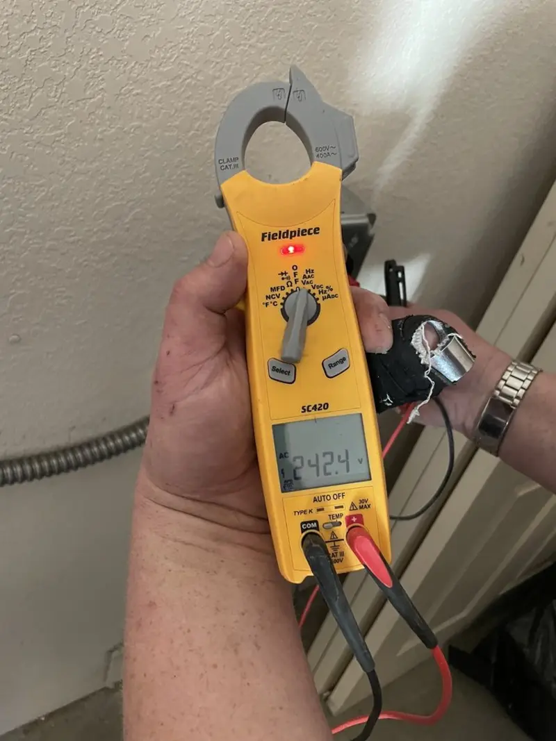 Voltage testing with clamp meter during Ceiling Fan Installation in Kenhorst